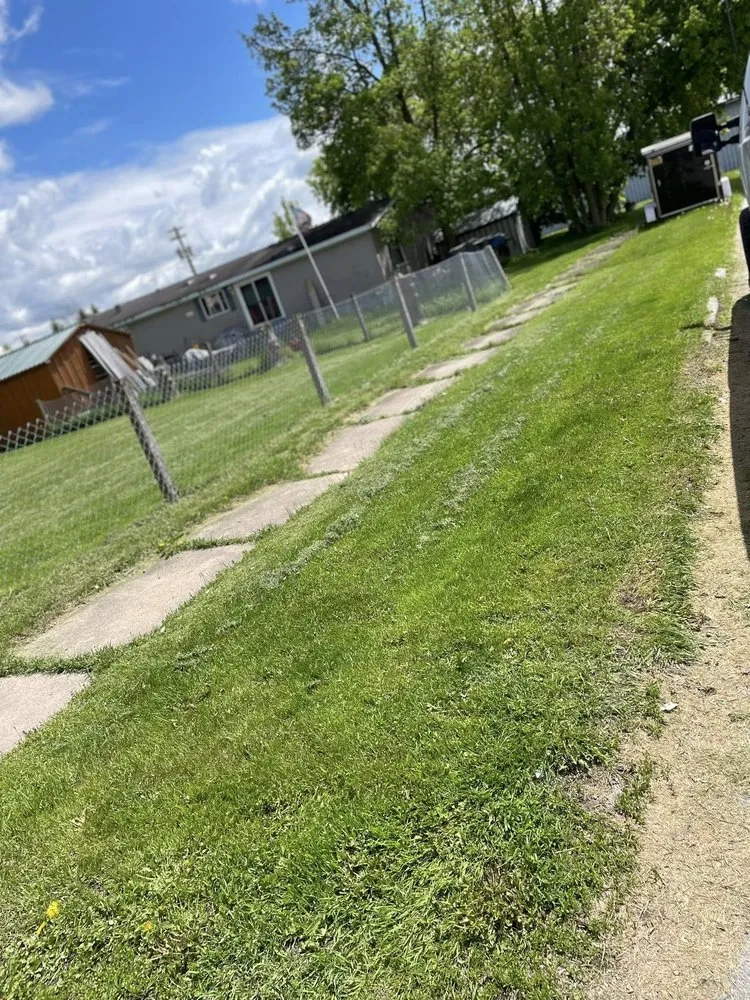 Professional lawn care service with custom design in Ogdensburg, NY by Ashley's Lawn Care