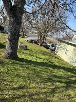 Ashtons Yard Maintenance Logo