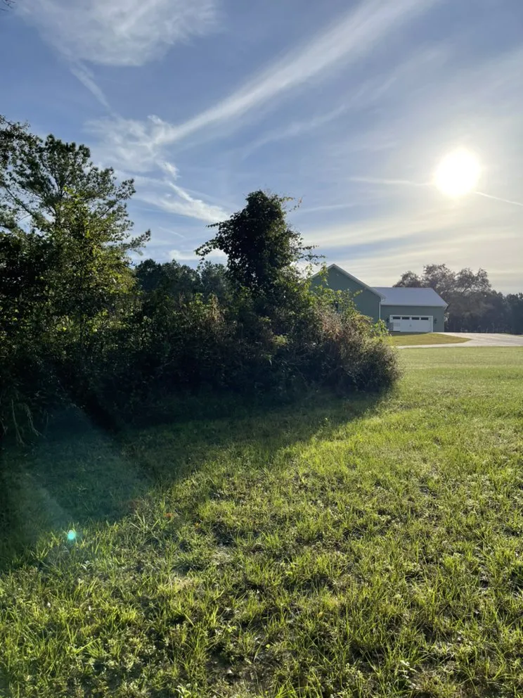 Expert lawn mowing service for homes in Lee, FL by ASR Affordable Stump Removal