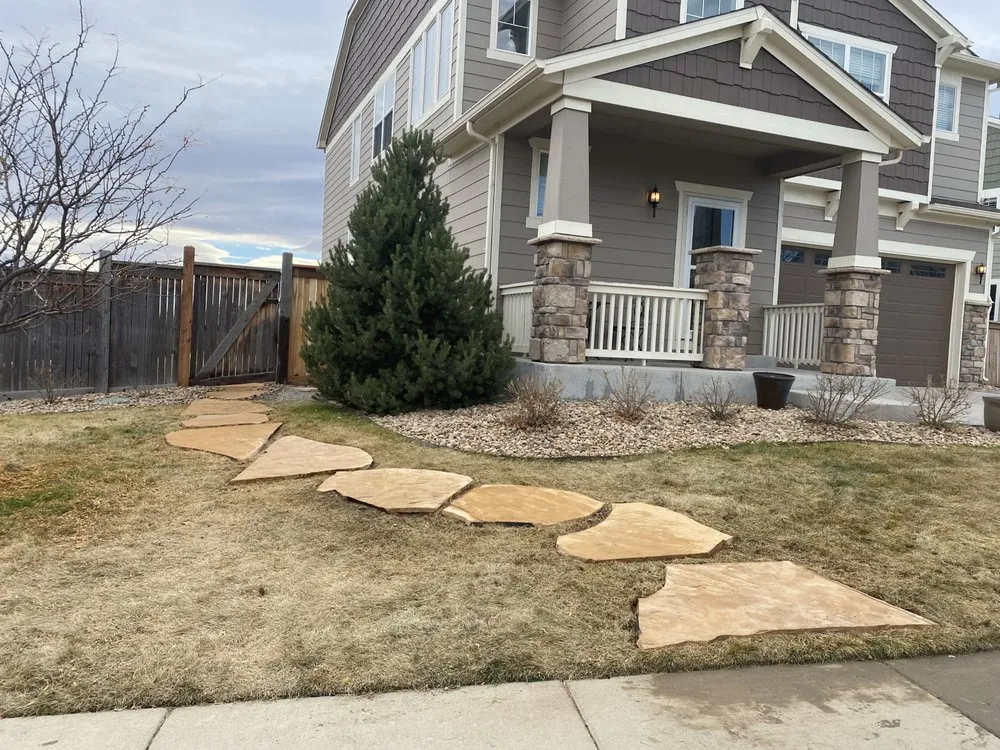 Custom lawn mowing service for beautiful yards in Brighton, CO by Associates Landscape