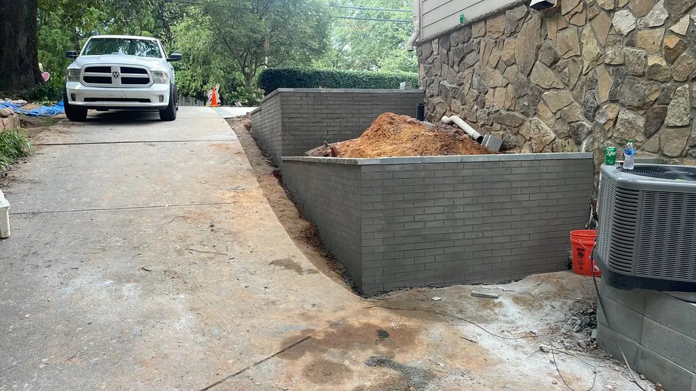 Professional landscape design for outdoor upgrades in Atlanta, GA by AT Landscaping & Construction