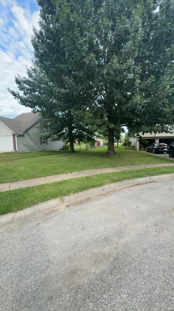 Custom garden landscaping for residential properties in Warrensburg, MO by A&T Precision Lawn Care