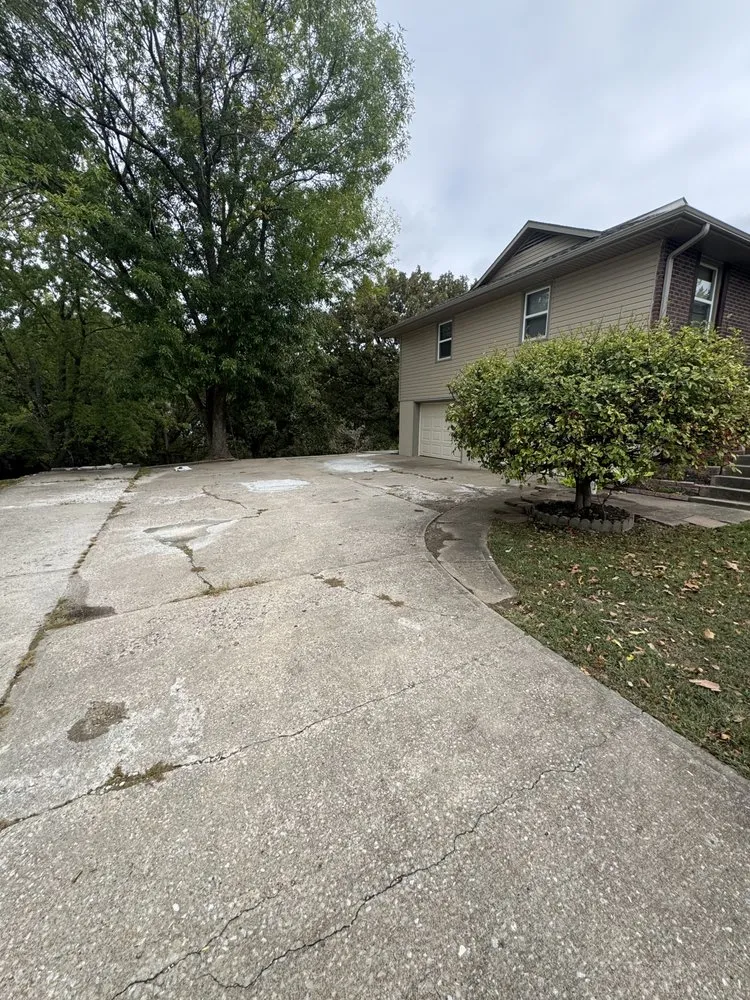 Professional yard maintenance for homes in Warrensburg, MO by A&T Precision Lawn Care