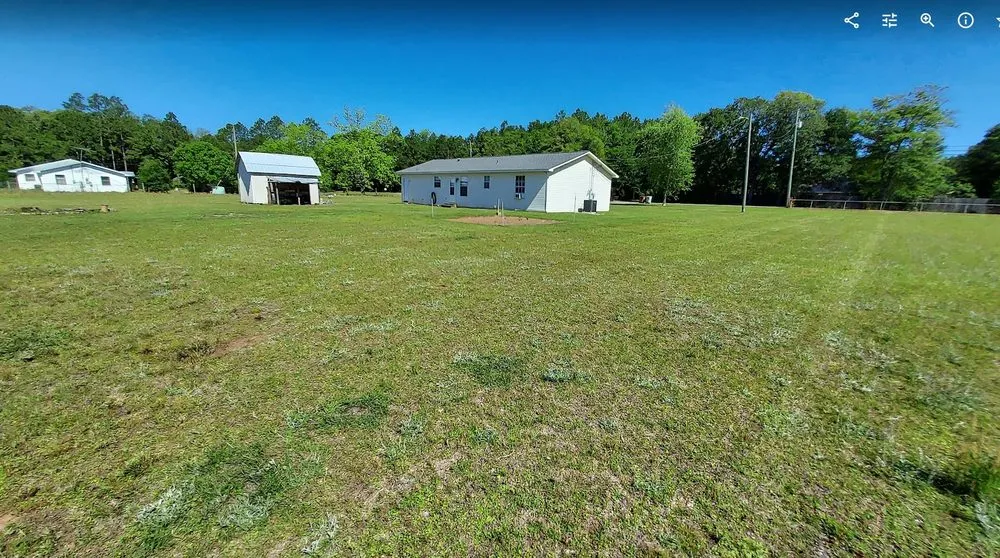 Custom outdoor landscaping for homes in Cantonment, FL by At The Cornerstone