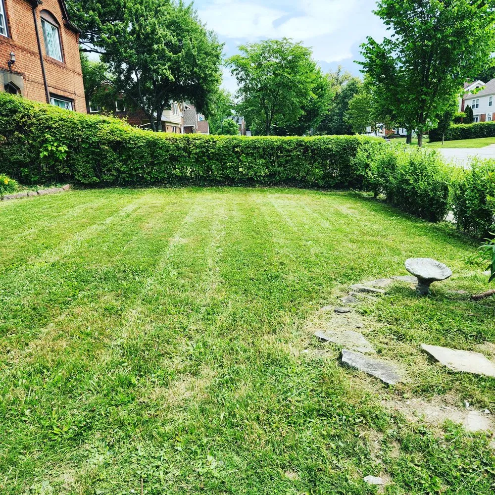 Custom landscape installation for homes across Cleveland, OH - At Your Service Landscaping