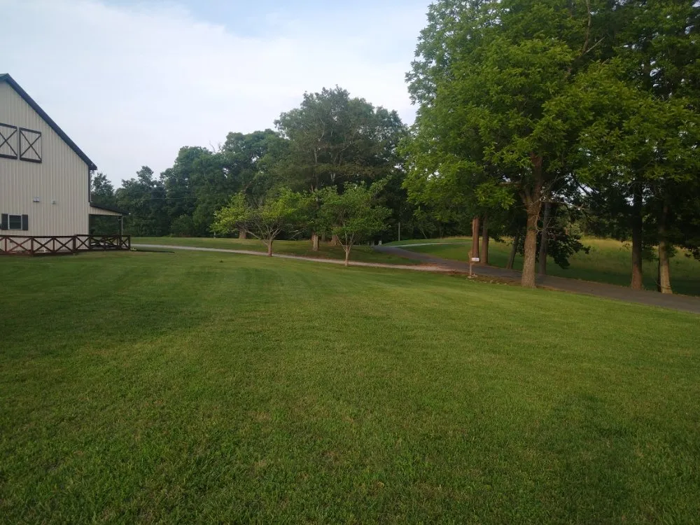 Local landscaping services for homes in Benton, KY by At Your Service Tree and Lawn Care
