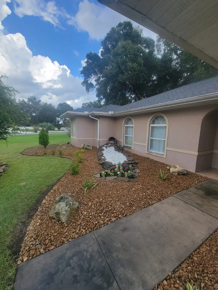 Reliable lawn mowing service for year-round maintenance in Summerfield, FL by Athen's EC Landscaping