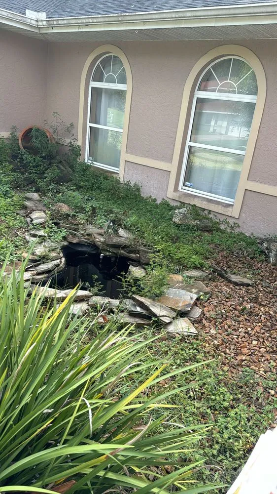 Affordable lawn mowing service for homes in Summerfield, FL by Athen's EC Landscaping