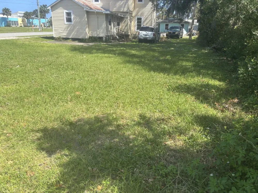Trusted yard cleanup service for residential properties across New Smyrna Beach, FL - Athletic Lawn Care
