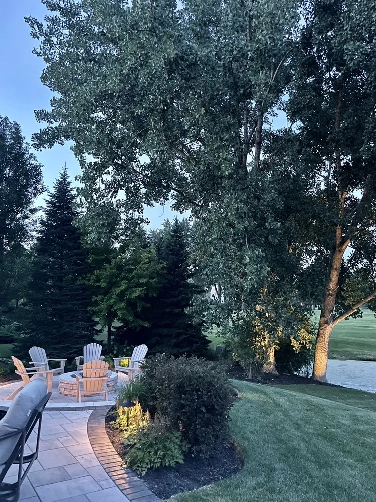 Custom yard cleanup service with custom design across Crystal Lake, IL - Atmospheric Lighting