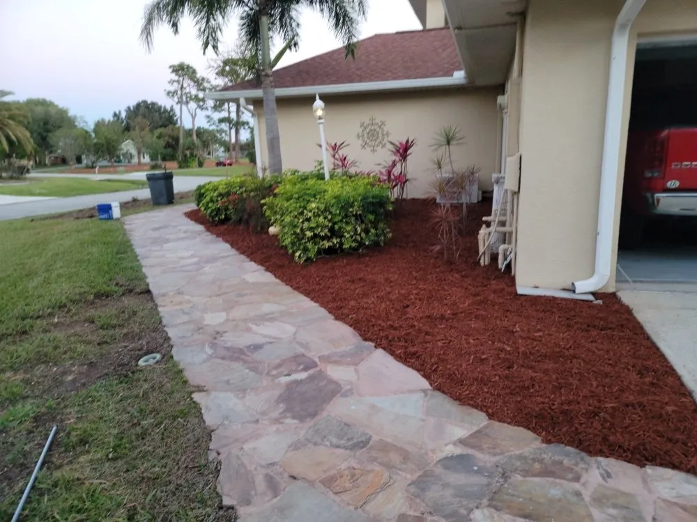 Custom outdoor landscaping for residential properties across Palm Bay, FL - A+Trees & Stump Grinding