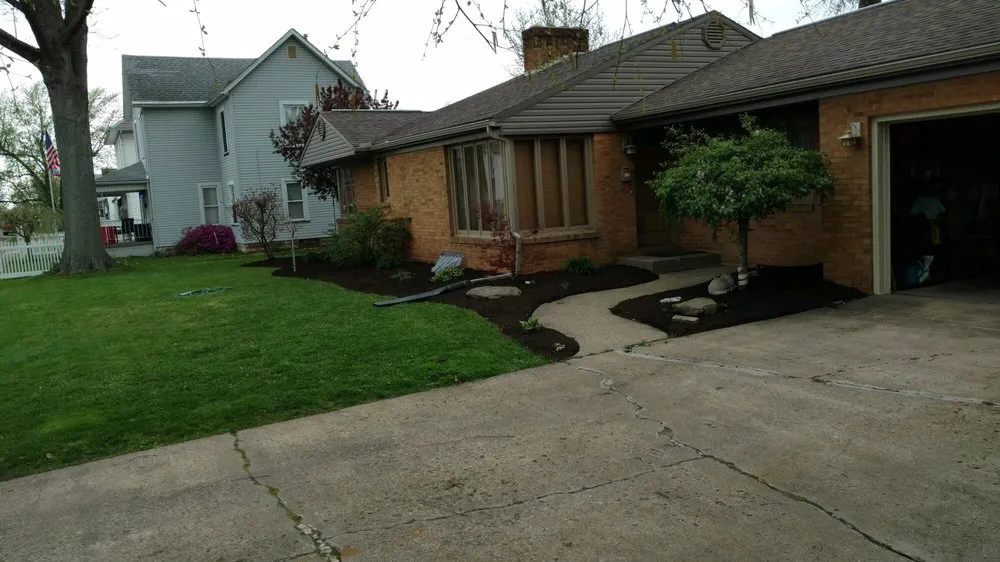 Top-rated lawn mowing service for beautiful yards in New Philadelphia, OH by Atwood Lawn and Landscaping