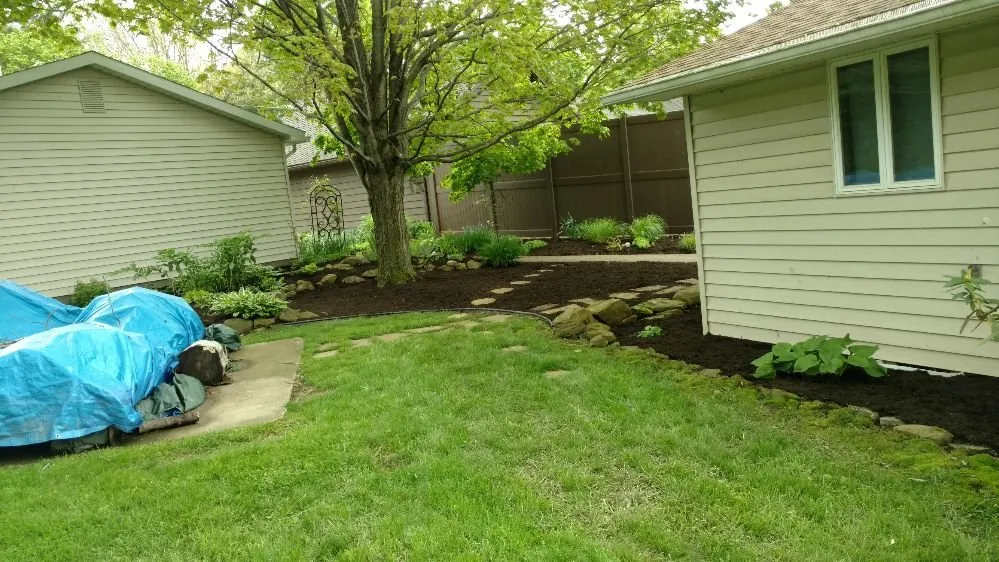 Professional yard cleanup service for year-round maintenance in New Philadelphia, OH by Atwood Lawn and Landscaping