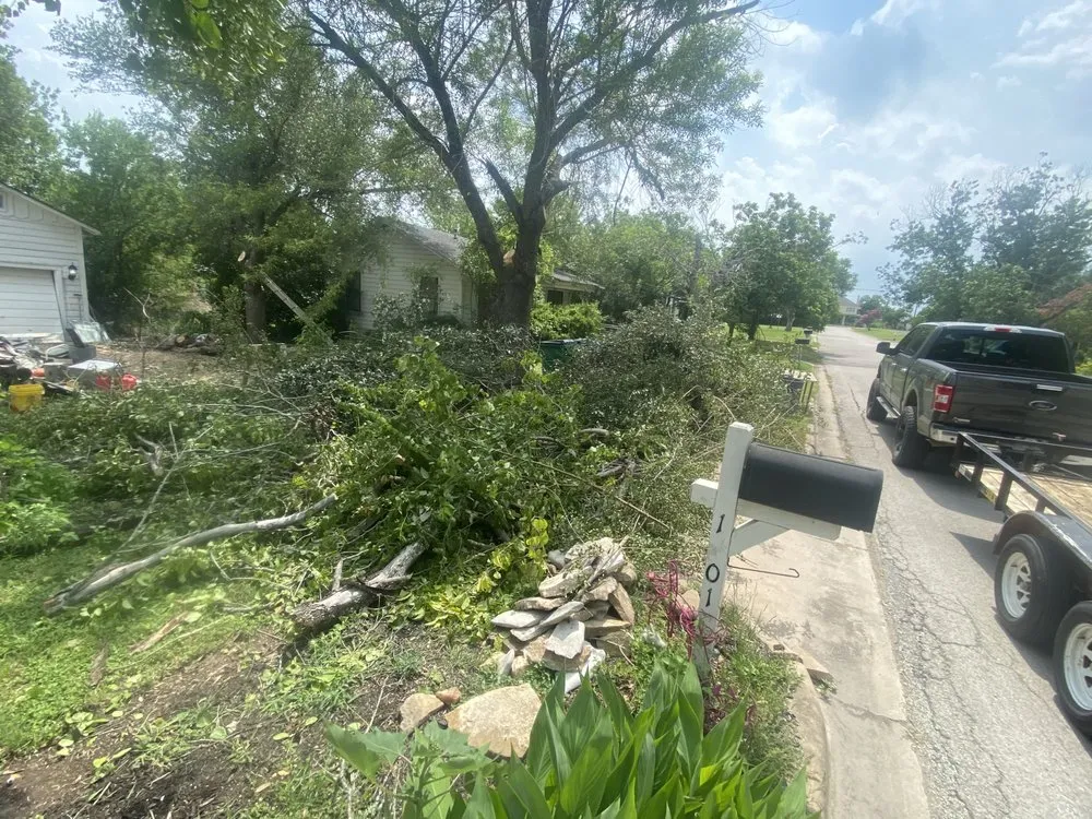 Professional lawn mowing service with custom design in Leander, TX by Atx Junk Removal and Landscape Remodel