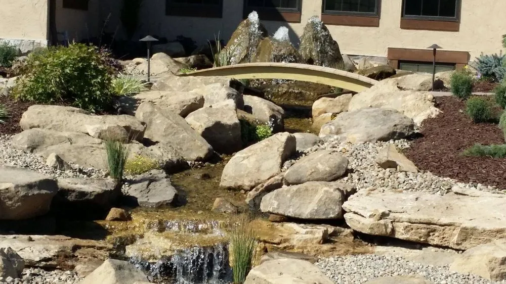 Local yard maintenance for residential properties in Canal Fulton, OH by Aura Concrete & Landscaping