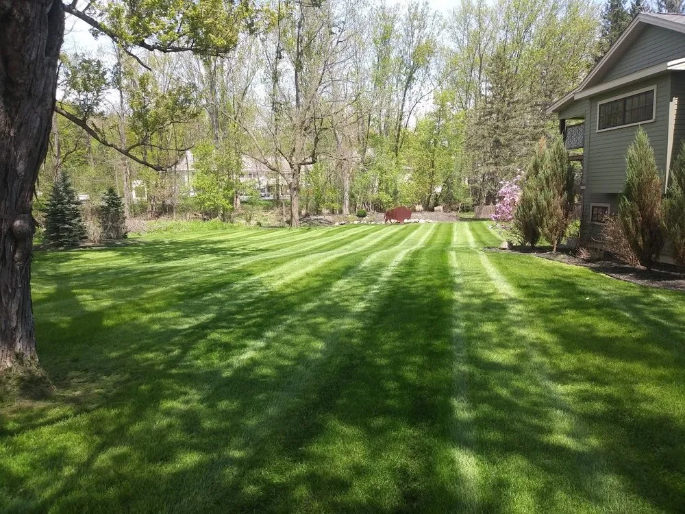 Custom landscape design for beautiful yards in East Aurora, NY by Aurora Lawn Services