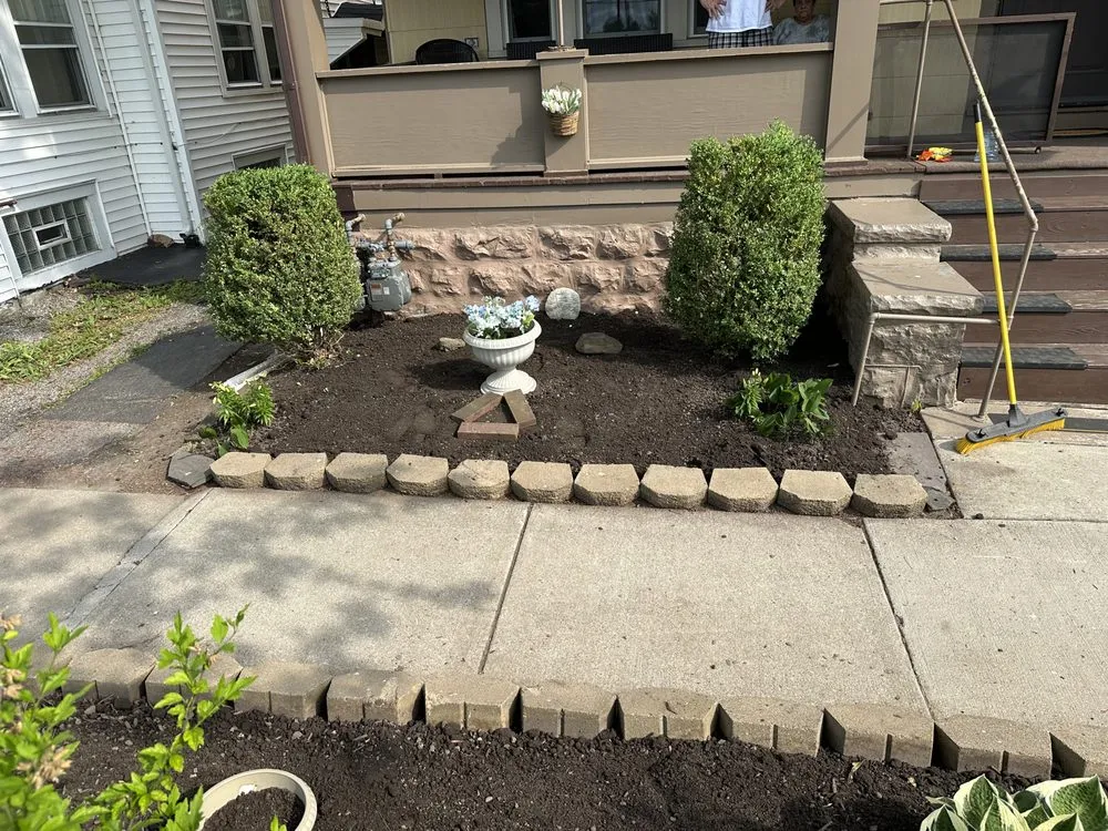 Professional landscape design with custom design in Lockport, NY by Austin Landscaping