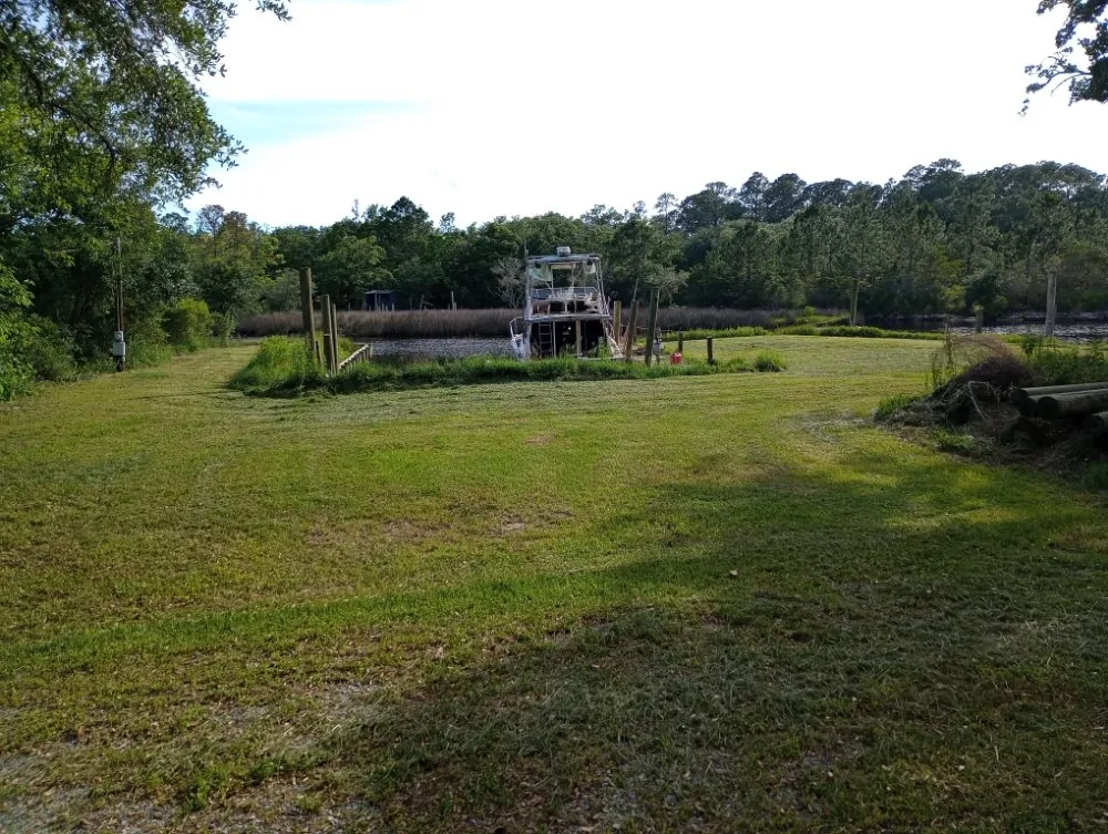 Top-rated lawn mowing service near you across Moss Point, MS - Austin's Mean Green Lawn Solutions