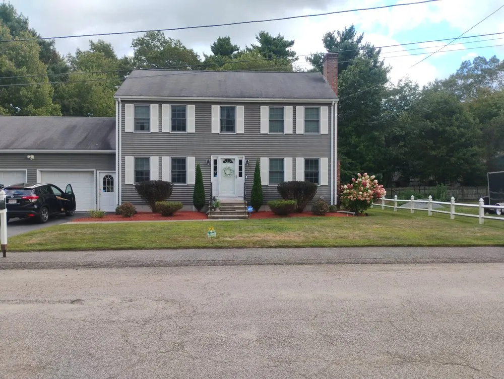 Affordable lawn mowing service with custom design in East Providence, RI by Authentic Landscaping