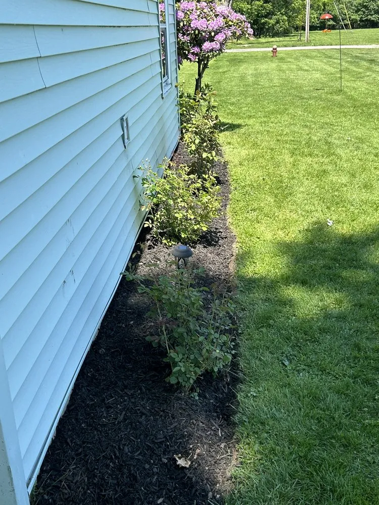 Local landscape design with custom design in Medina, NY by Authentic Lawn Care