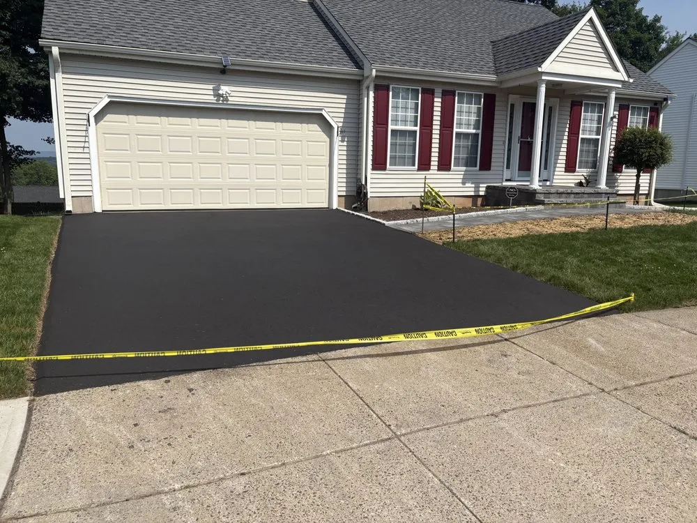 Custom landscape installation for homes in Middletown, CT by Authentic Paving & Masonry