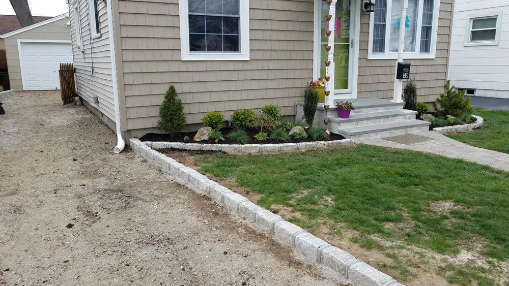 Custom outdoor landscaping for homes across Lindenhurst, NY - Autumn Leaves Landscape and Design