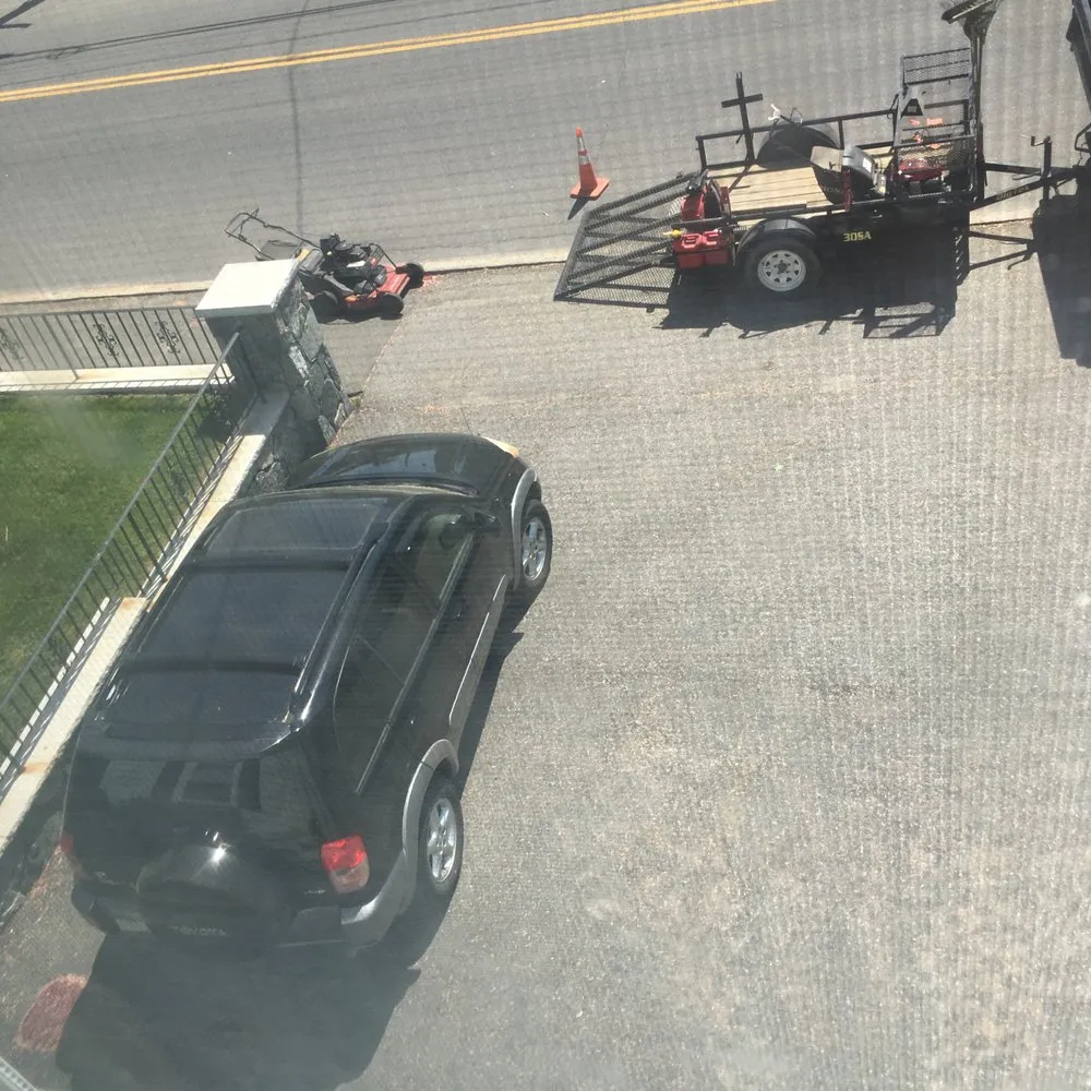 Expert lawn mowing service in Waltham, MA by Avco Landscaping & Irrigation