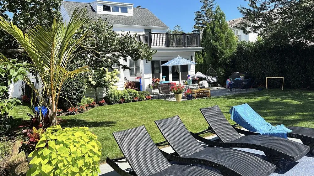 Custom landscape installation in West Hempstead, NY by Aversa Property Services