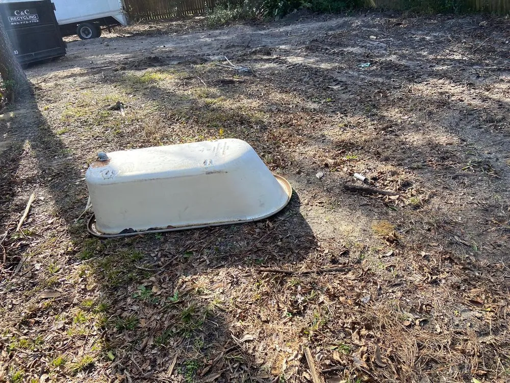 Professional yard cleanup service for residential properties in Wedgefield, SC by Avery's Junk Removal and Demo