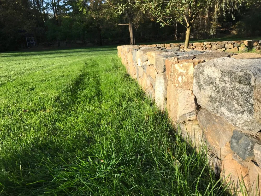 Professional lawn mowing service for year-round maintenance across Stamford, CT - Avila Landscaping Masonry