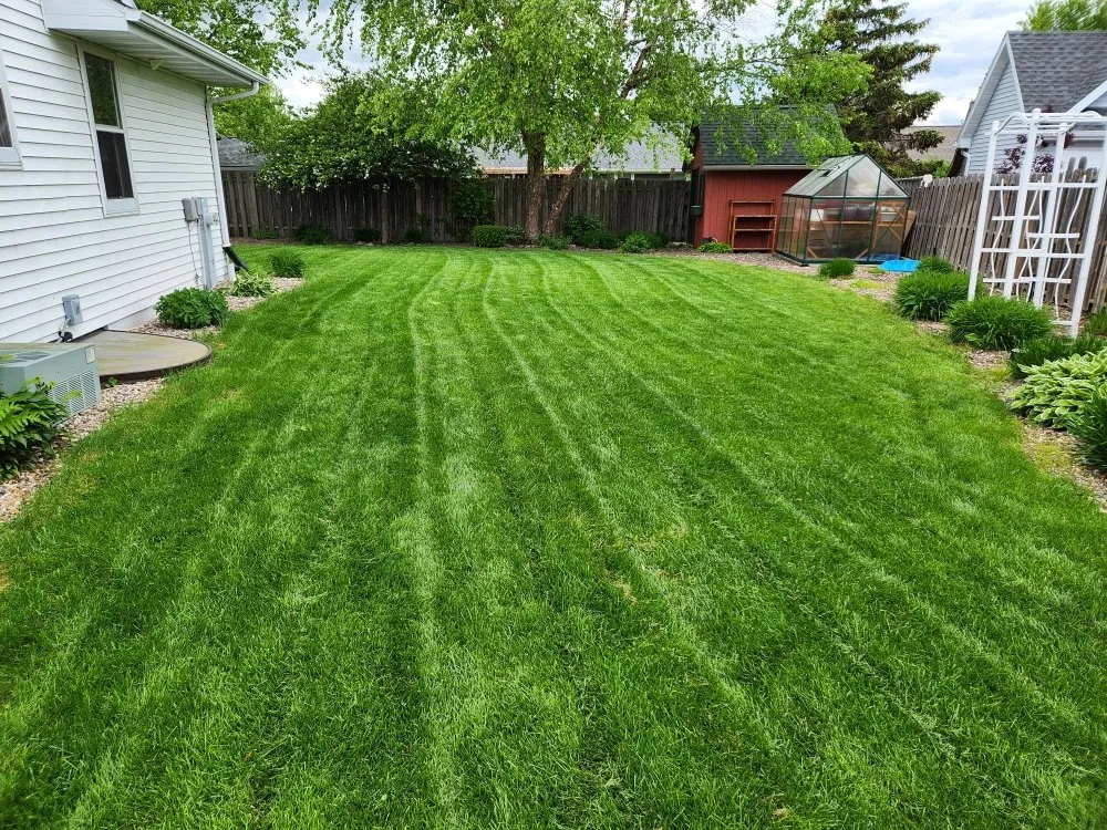 Professional lawn mowing service for outdoor upgrades in De Pere, WI by Awoc Lawn Care