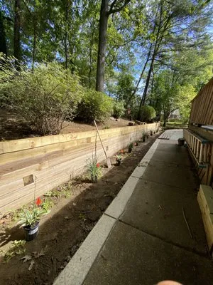 AXC Landscaping Services Logo