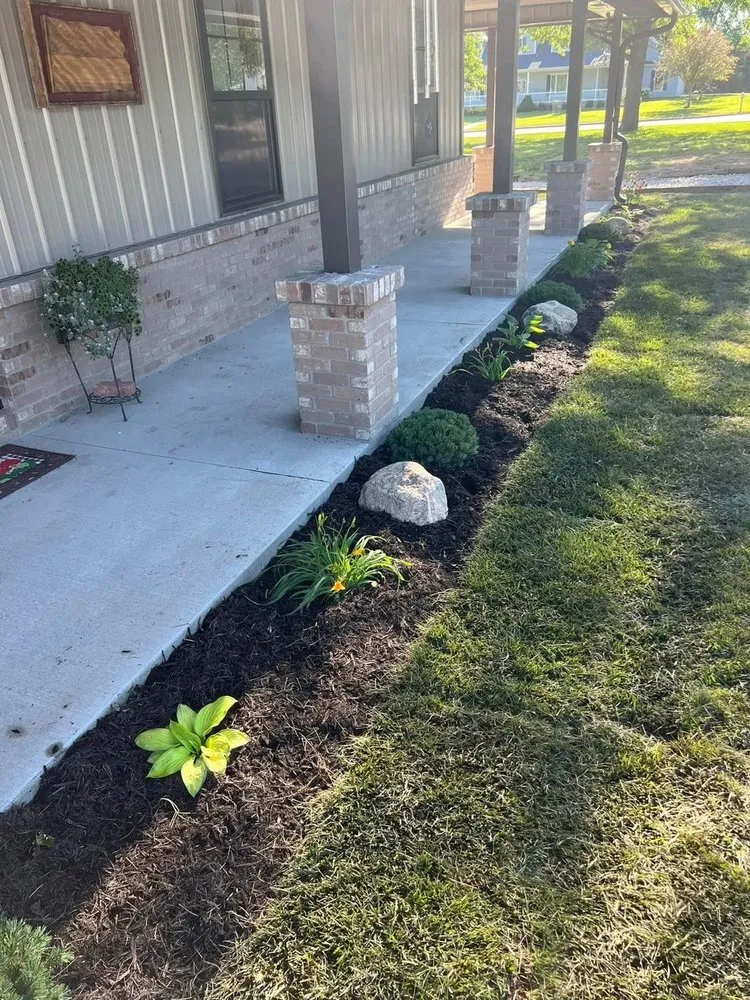 Custom residential landscaping with custom design in Exeter, NE by Axline Landscaping & Trees