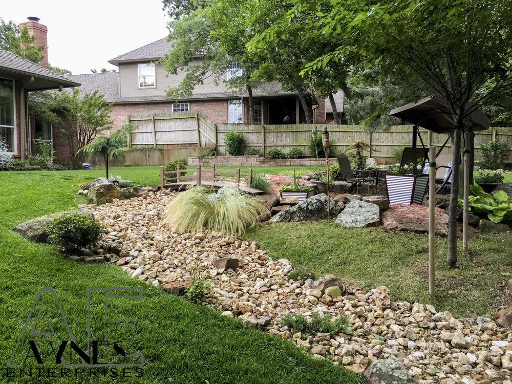 Affordable lawn mowing service for homes in Edmond, OK by Aynes Enterprises