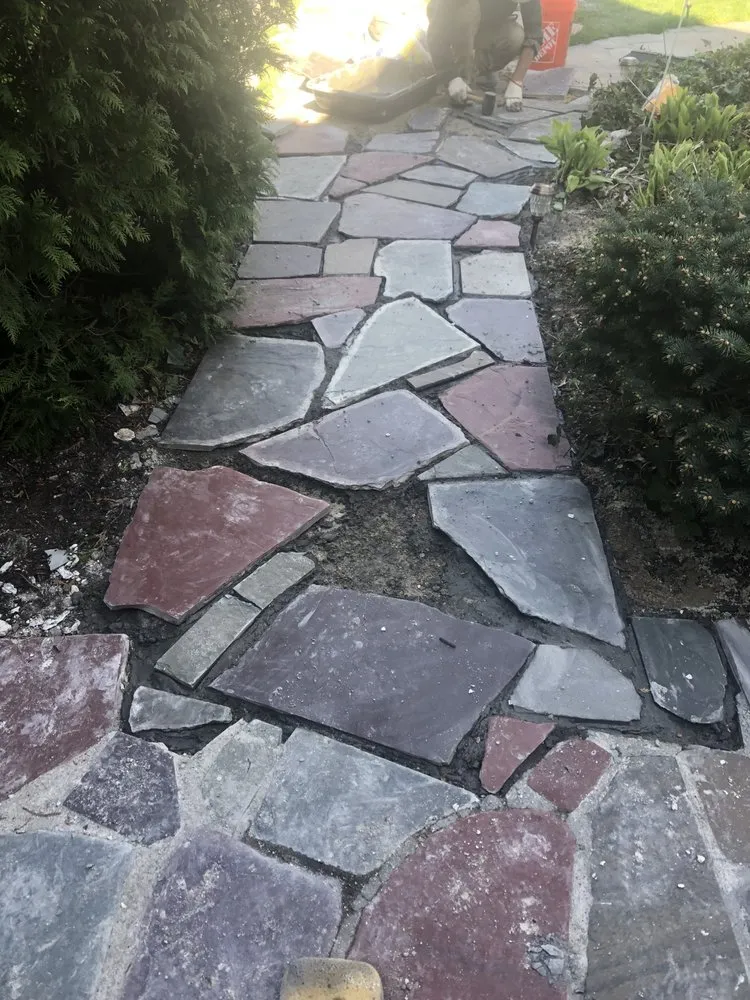 Custom lawn mowing service in Boston, MA - Aztec Paving & Masonry