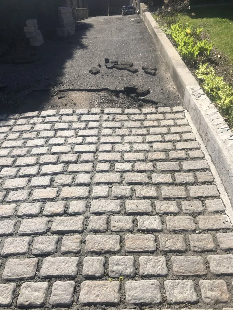 Professional lawn mowing service for beautiful yards across Boston, MA - Aztec Paving & Masonry