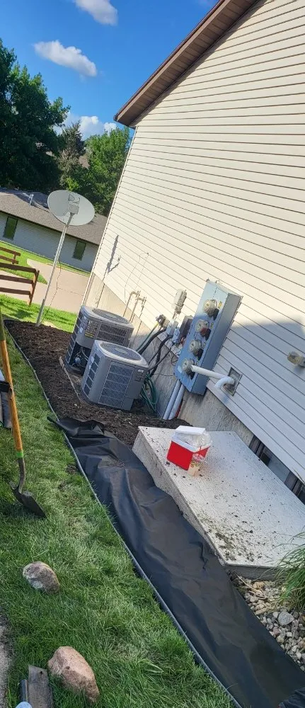 Local landscape installation with custom design in Sioux Falls, SD by B & B Landscaping And Snow Removal