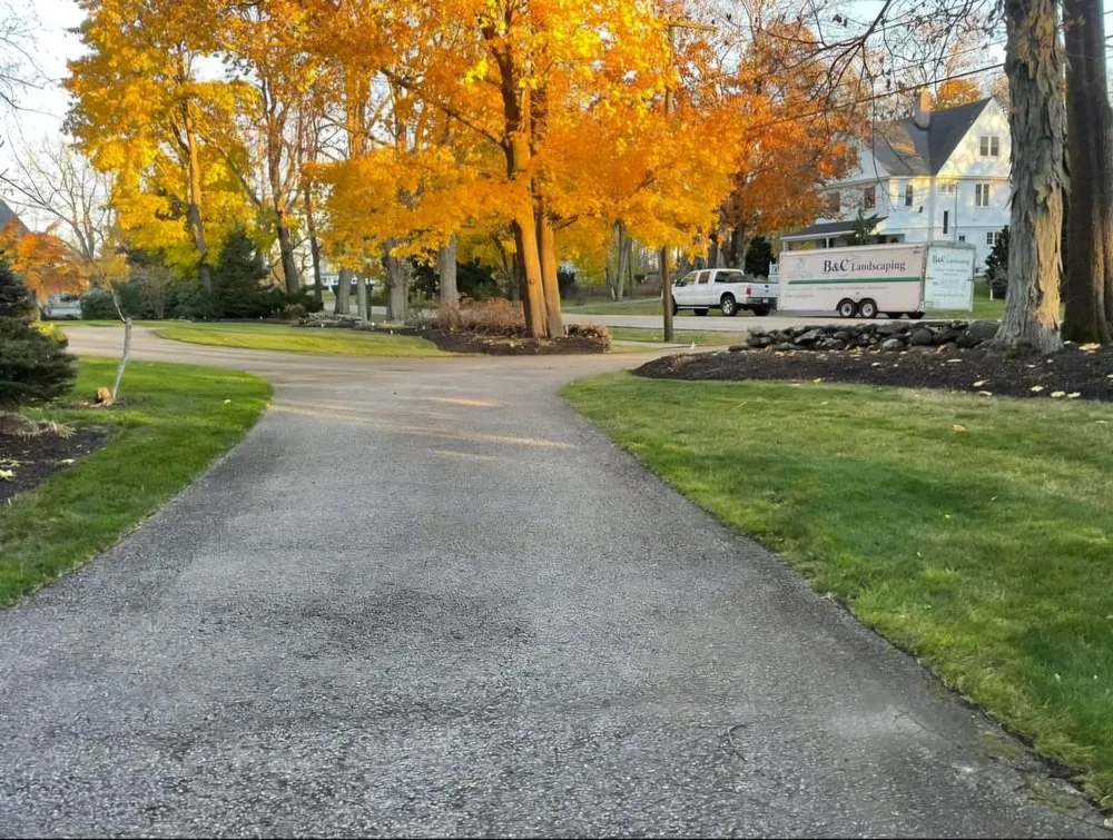 Professional yard cleanup service for homes in Windham, NH by B & C Landscaping