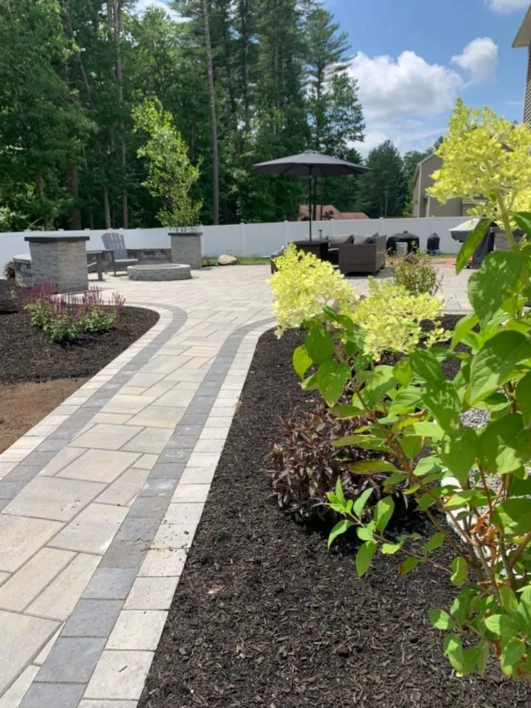 Custom residential landscaping for year-round maintenance in Windham, NH by B & C Landscaping