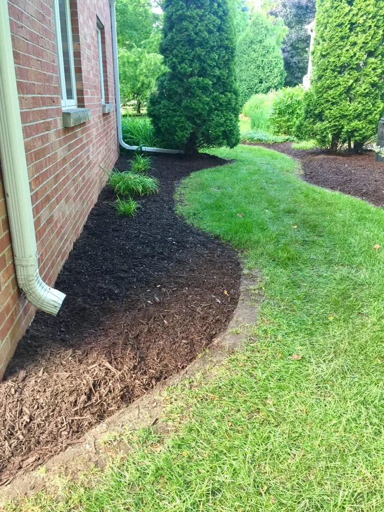 Affordable garden landscaping for year-round maintenance across Green Bay, WI - B & L Lawn and Landscape