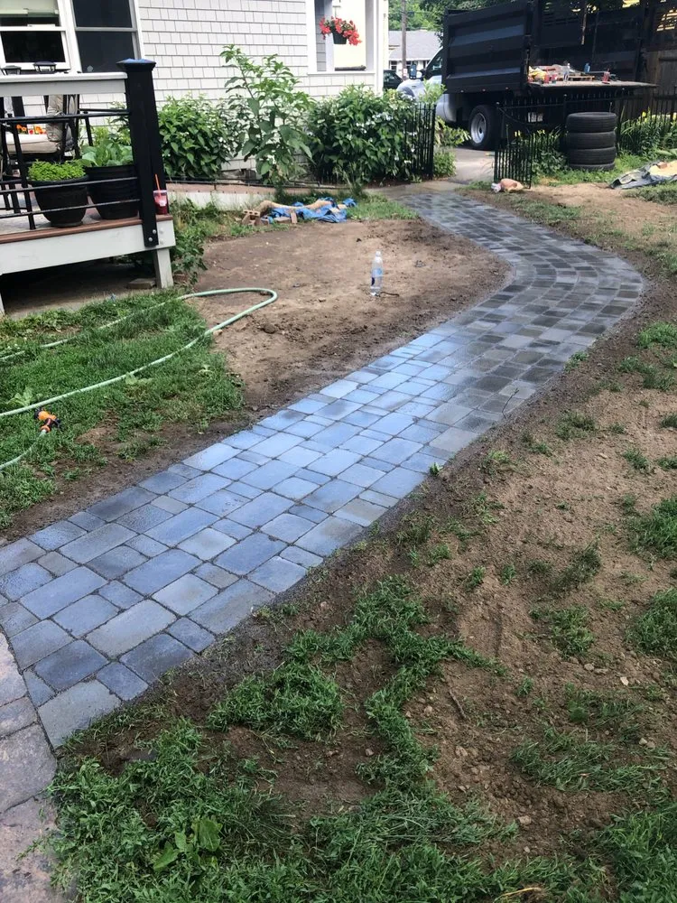Custom landscape installation in Rowley, MA by B & M Landscaping and Construction