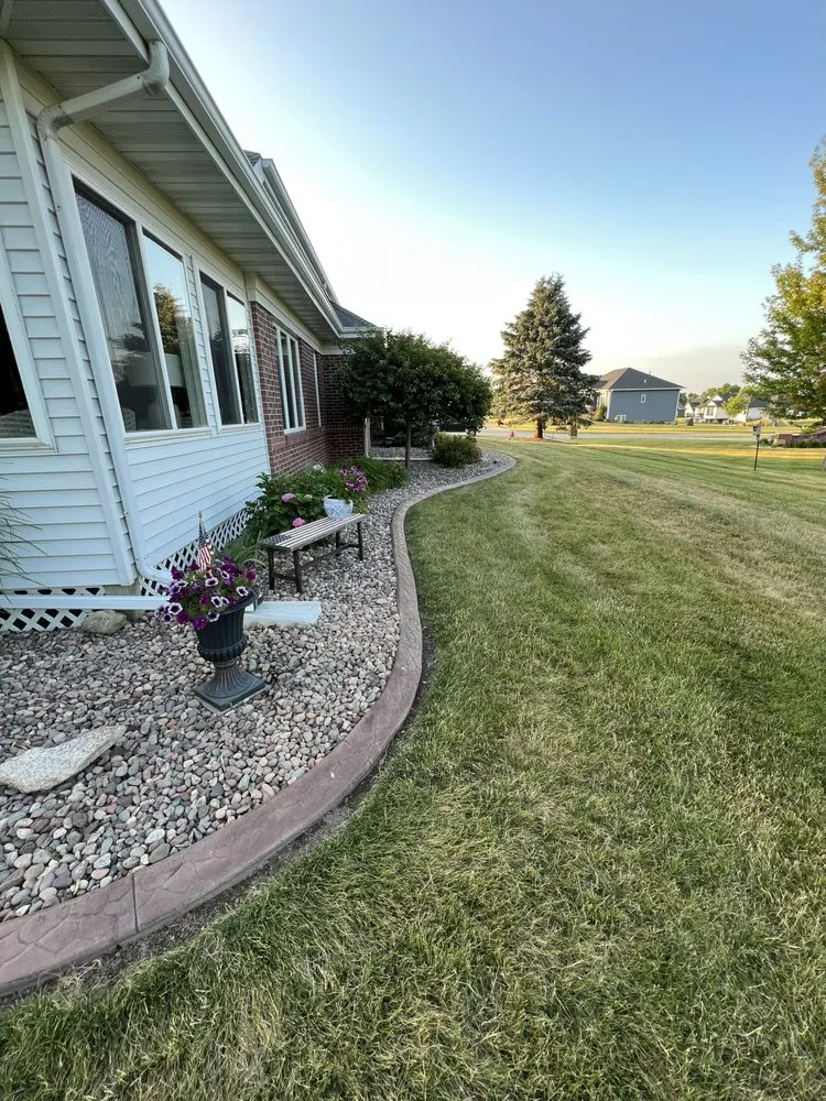 Top-rated yard cleanup service for outdoor upgrades in Dubuque, IA by B & T Curbing