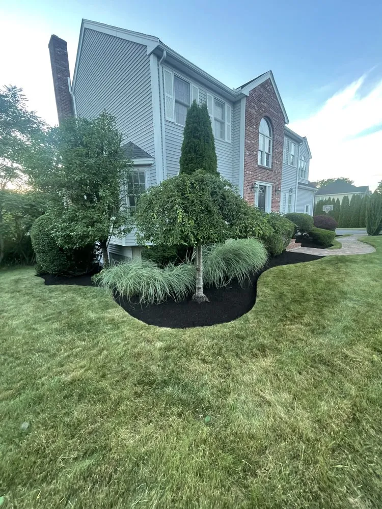 Custom yard cleanup service for year-round maintenance across Clinton, MA - B&A Landscaping