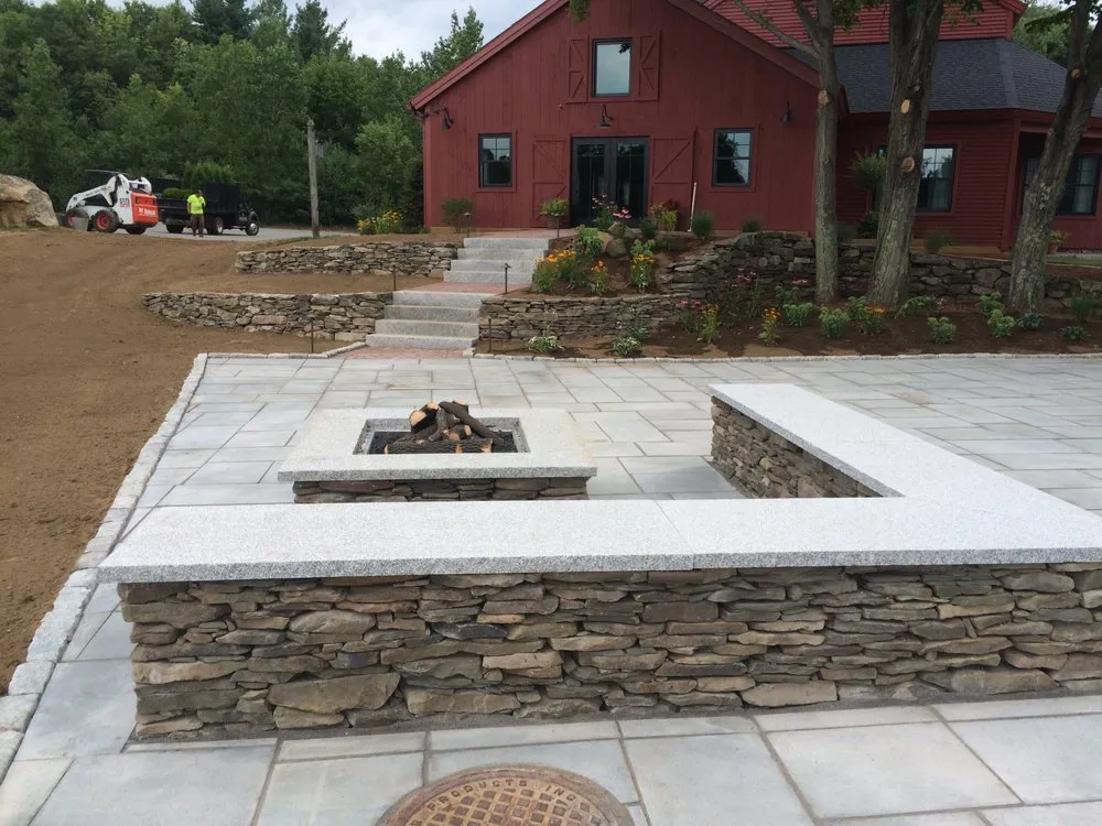 Expert landscaping services for residential properties in Brimfield, MA by Babe's Lawn Care
