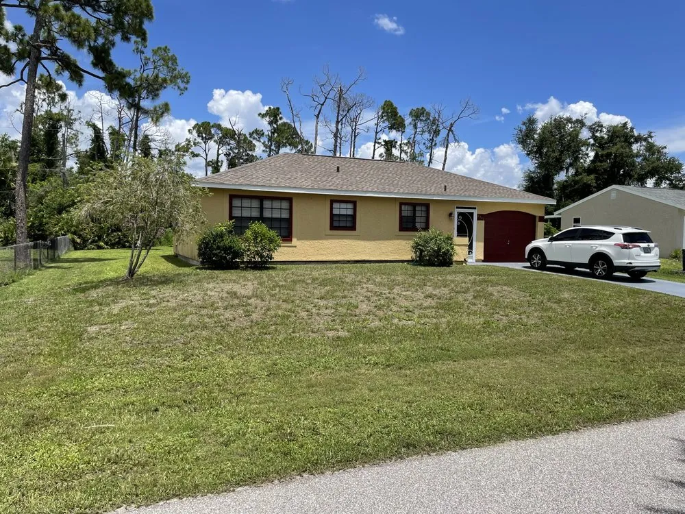 Expert yard maintenance for homes in Murdock, FL by Babins Lawn Service