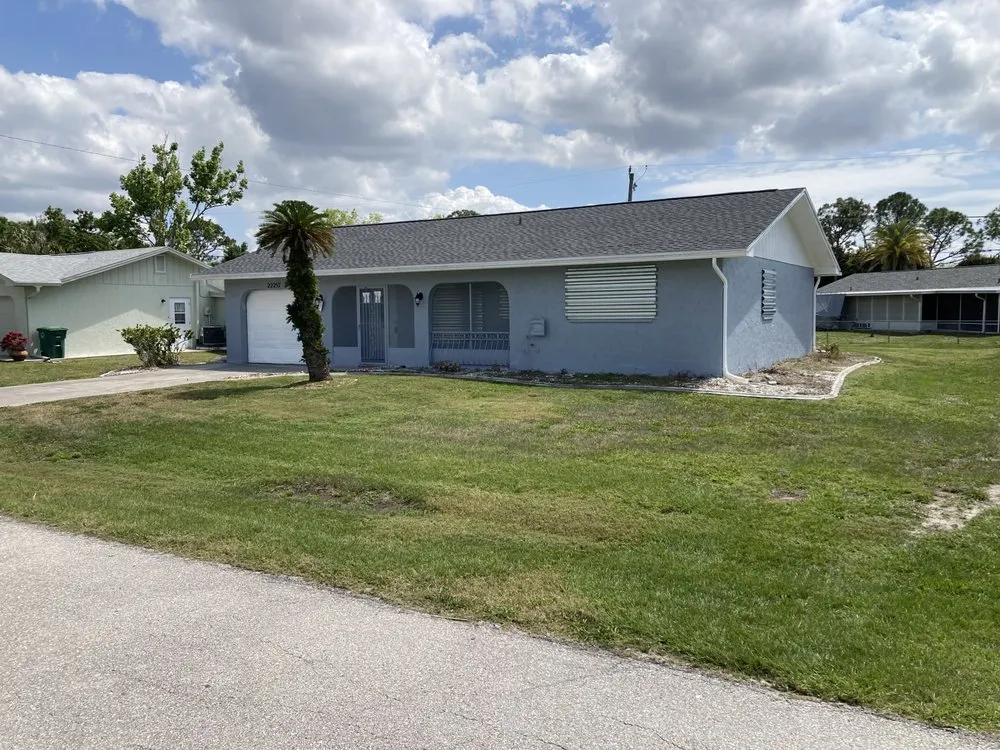 Expert lawn mowing service for homes in Murdock, FL by Babins Lawn Service