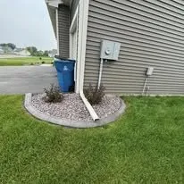 Professional landscape installation in Otsego, MN by Backroad Borders