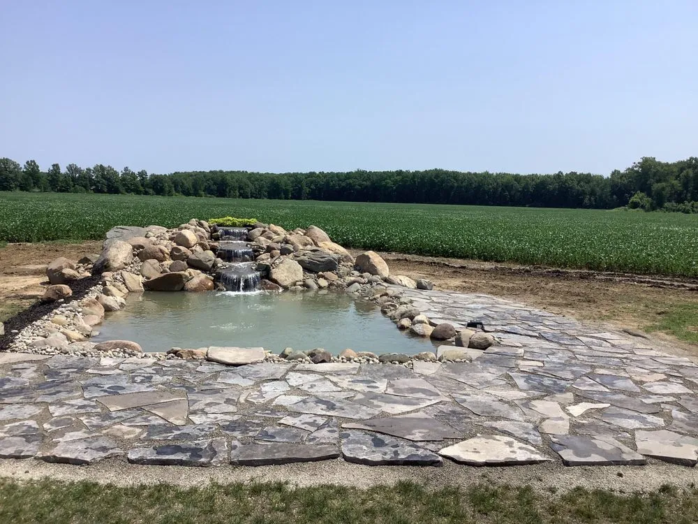 Reliable lawn care service for outdoor upgrades in Flint, MI by Backyard Oasis Pond & Garden Center