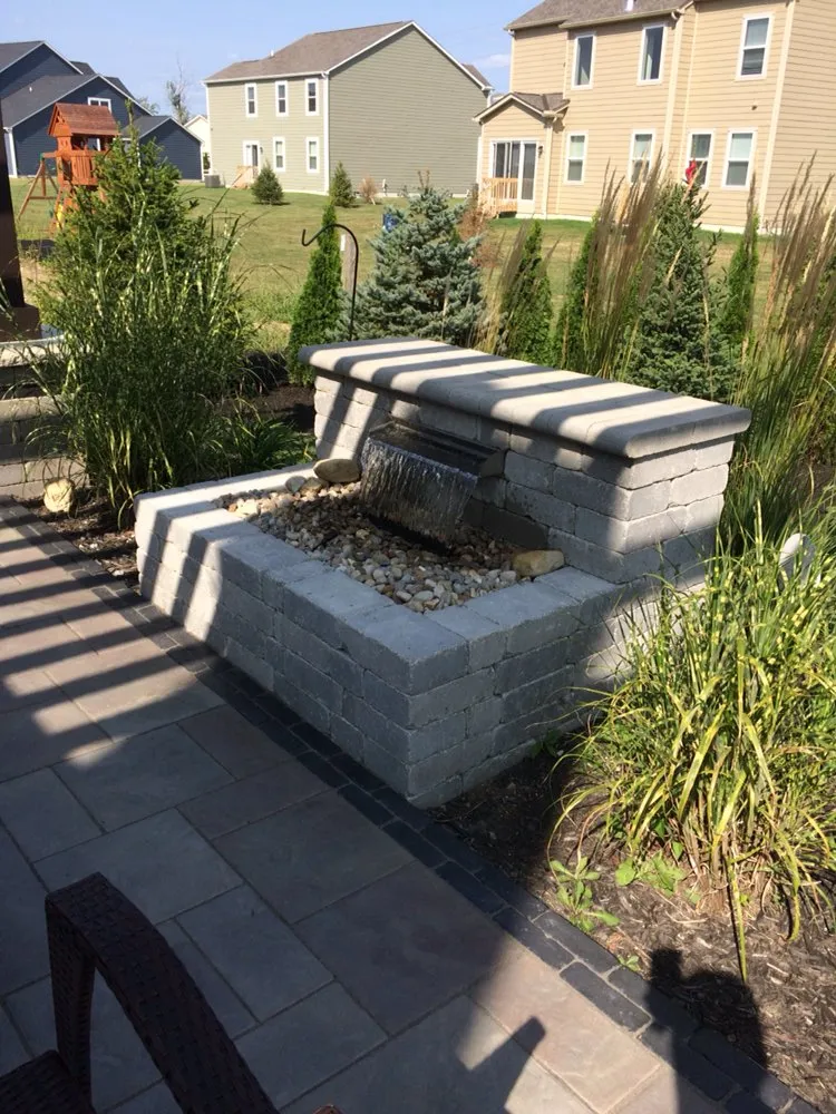 Custom lawn mowing service in Grove City, OH by Backyard Ponds & Patios