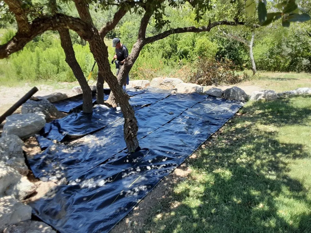 Custom lawn mowing service for year-round maintenance in San Antonio, TX by Backyard Siteworks